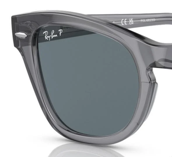 Close-up of Ray-Ban RB0707S Sunglasses showcasing their sophisticated gray acetate frames, polarized lenses, and the distinctive iconic logo on both the lens and arm.