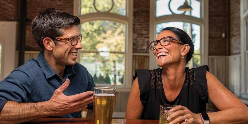 Happy people wearing glasses